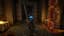 Armored knight enemy with glowing blue eyes holding a sword in a stone dungeon corridor in Everwind